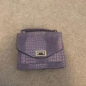 Purple snakeskin purse